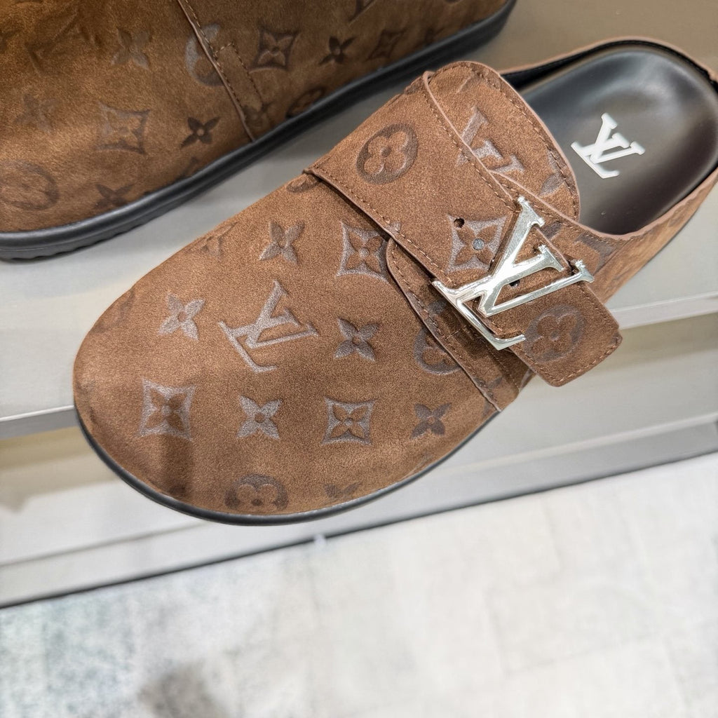 Louis Vuitton Embossed Buckle Slide Sandals — detail
