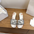 Dior Floral Embroidered Block-Heel Slide Sandals — hero