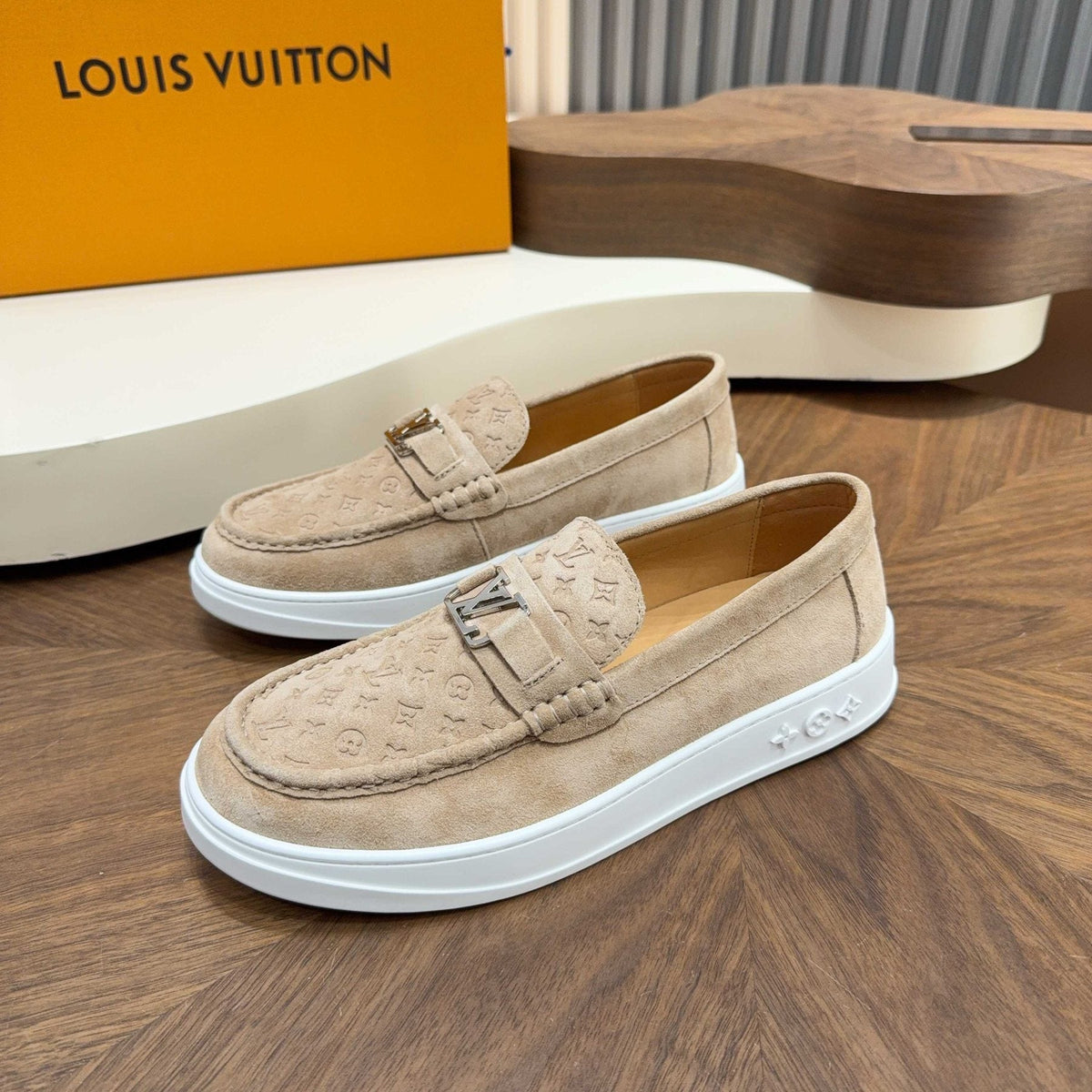 Louis Vuitton Embossed Slip-On Sneakers — front