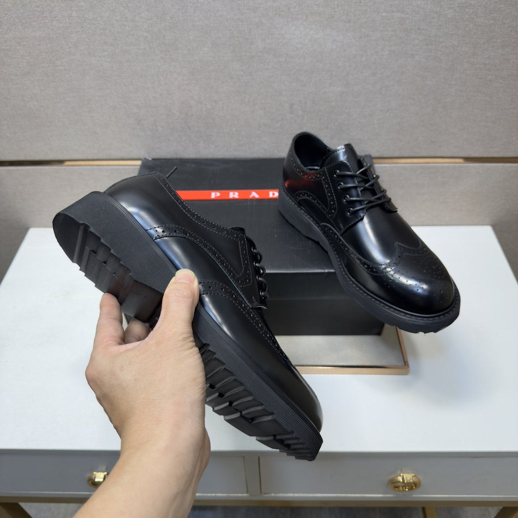 Prada Wingtip Lace-Up Shoes — model