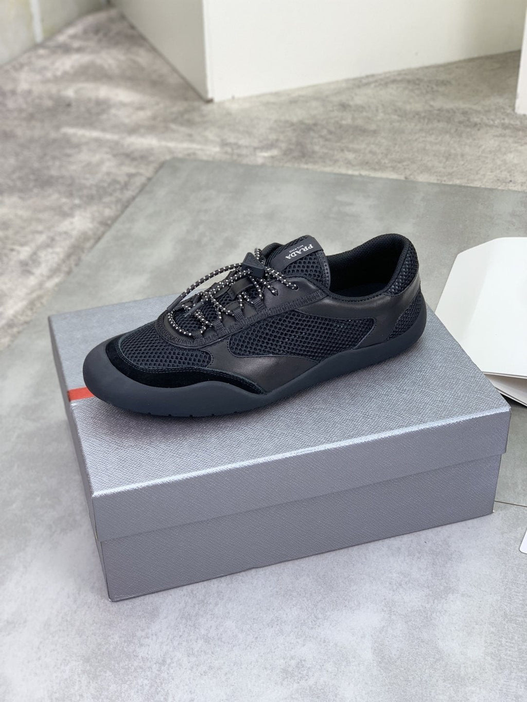 Prada Paneled Low-Top Sneakers — side