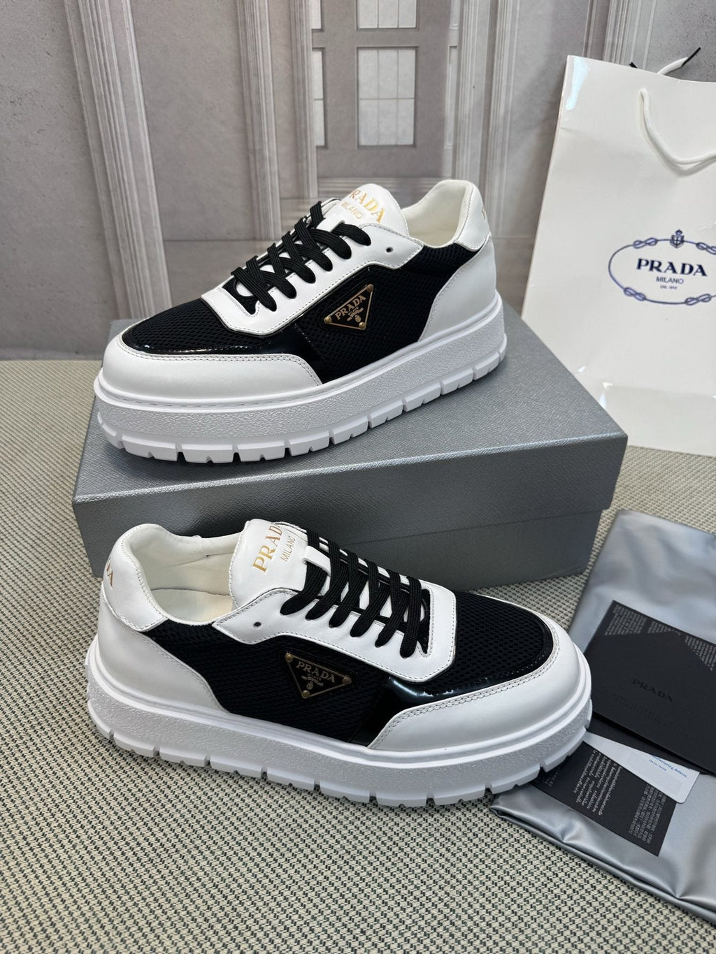 Prada Lug Sole Sneakers — side