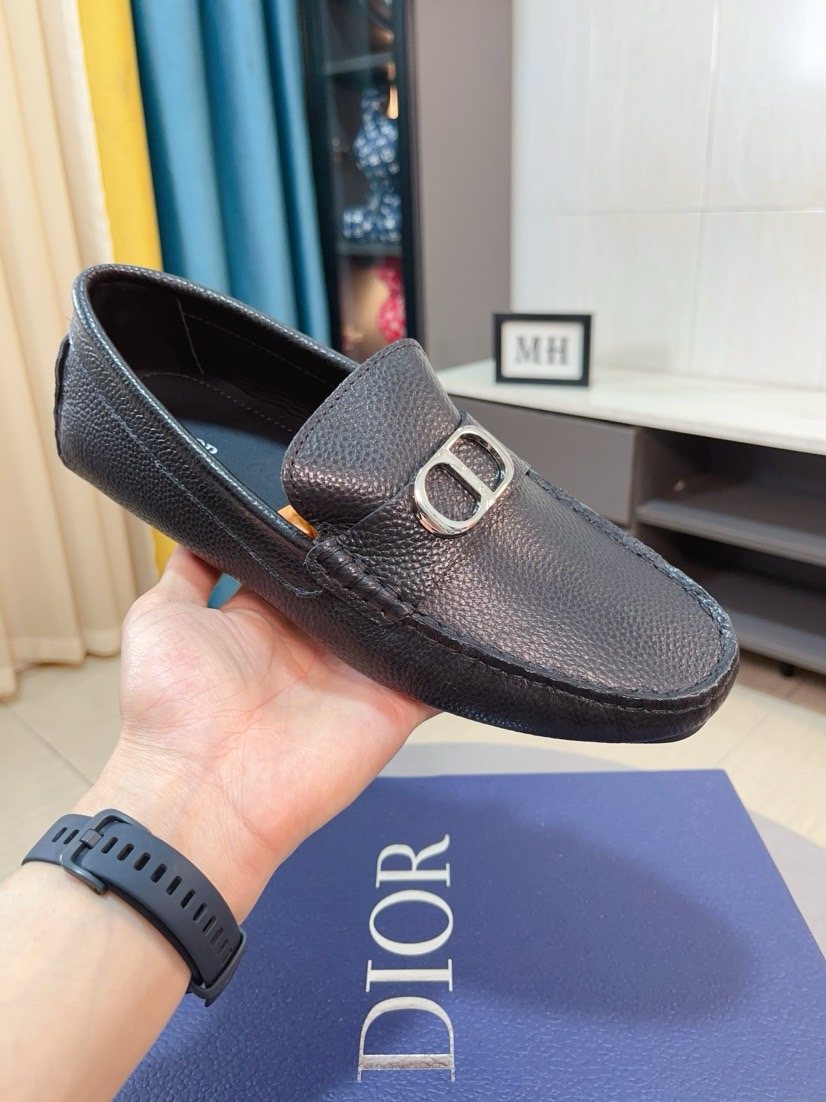 Dior Pebbled Buckle Loafers — model
