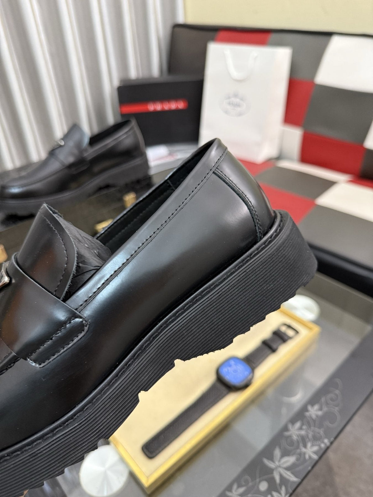 Prada Triangle Plaque Loafers — side