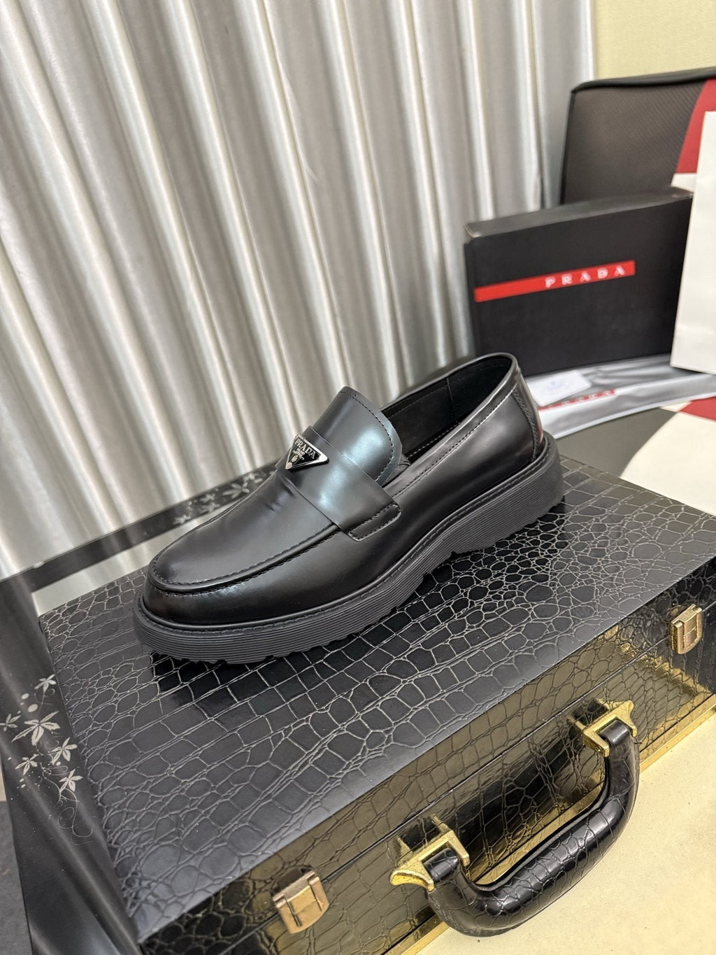Prada Triangle Plaque Loafers — front