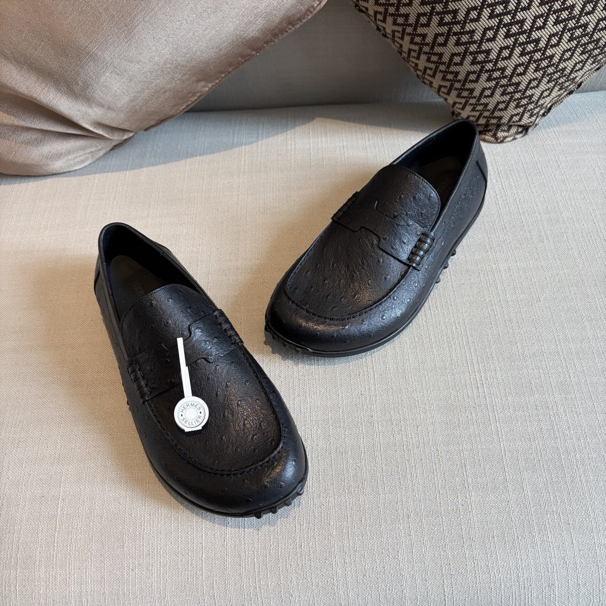 Hermès Textured Studded-Sole Loafers — front