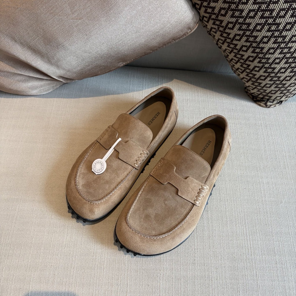 Hermès Textured Studded-Sole Loafers — front