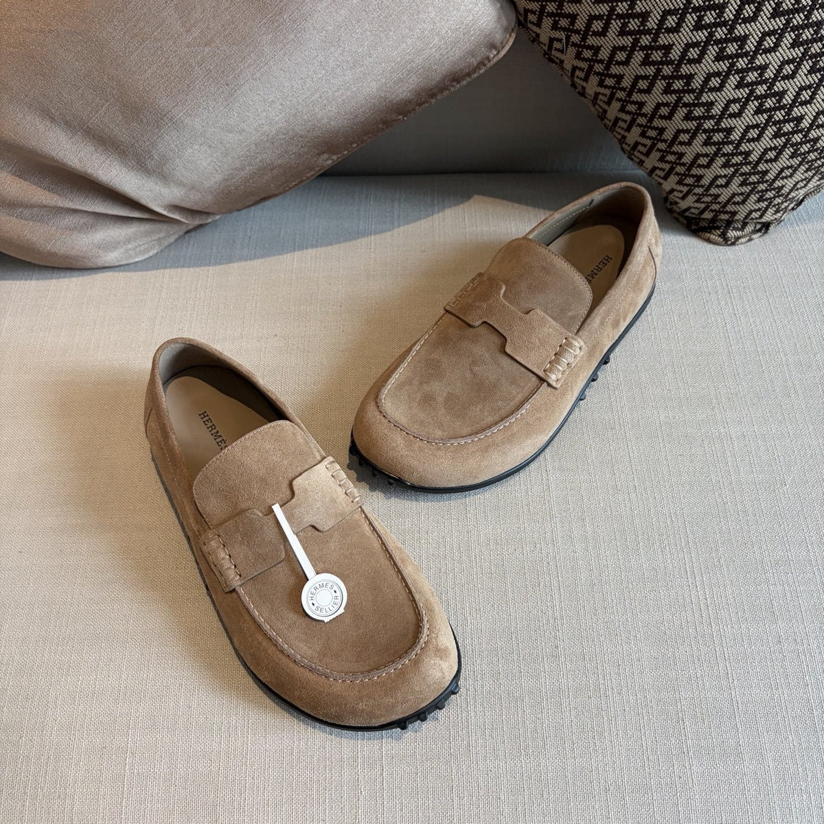 Hermès Textured Studded-Sole Loafers — front