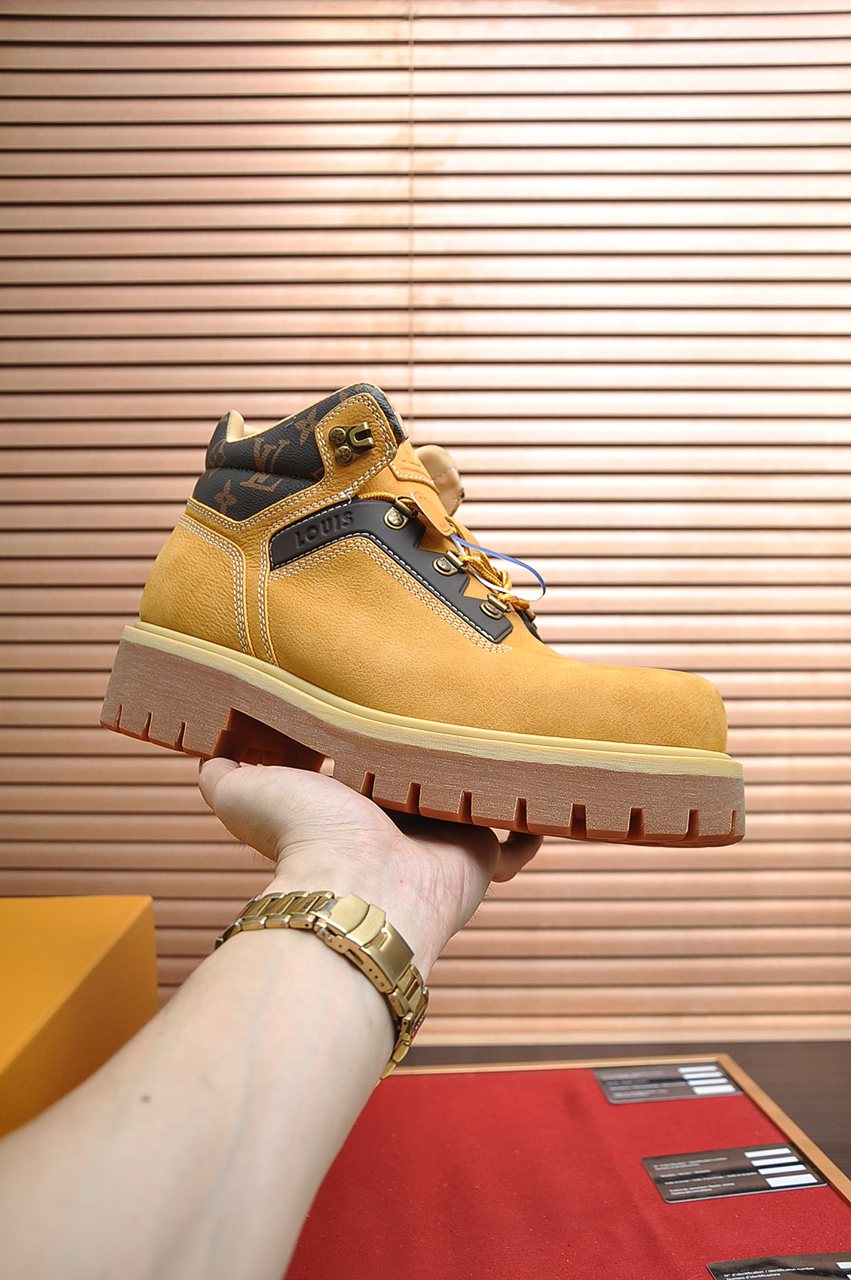 Louis Vuitton Lace-Up Lug-Sole High-Top Boots — model
