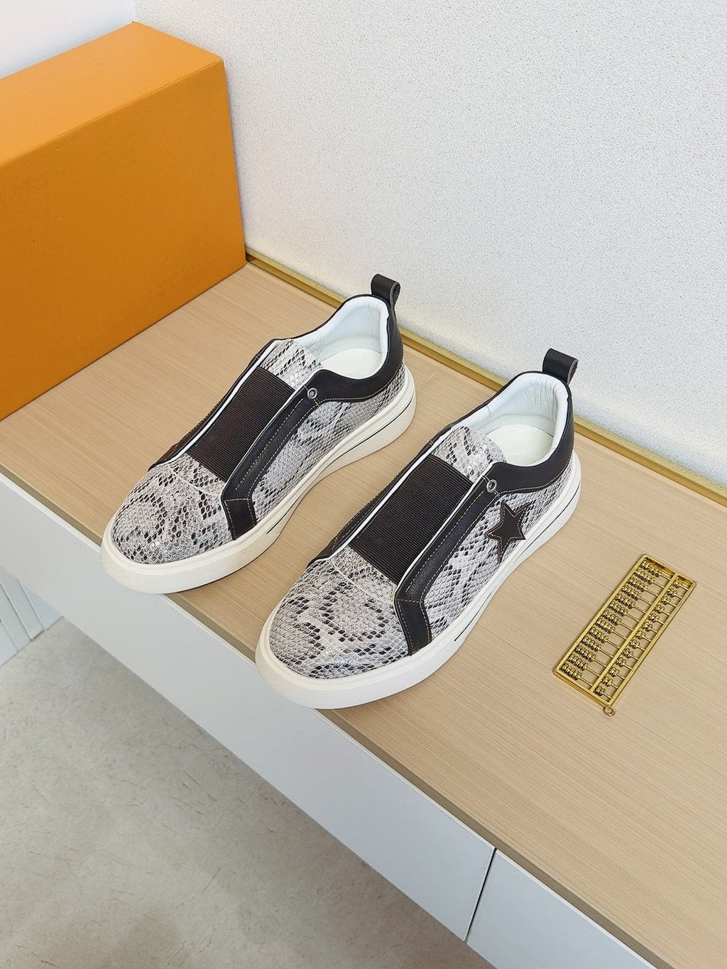 Louis Vuitton Star-Accent Low-Top Sneakers — front