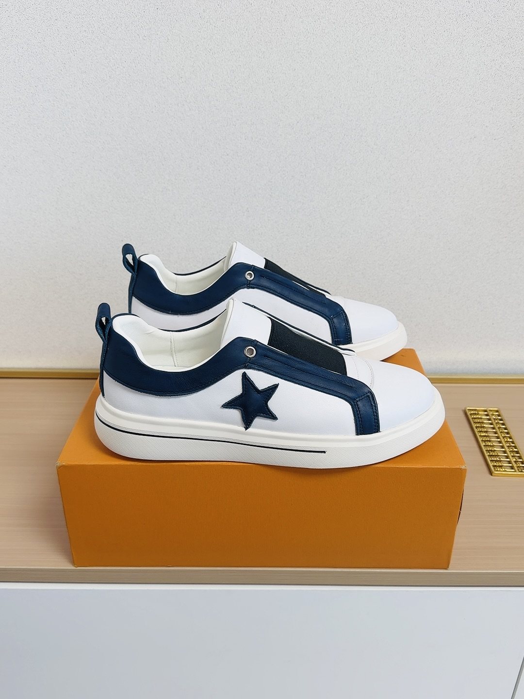 Louis Vuitton Star-Accent Low-Top Sneakers — front