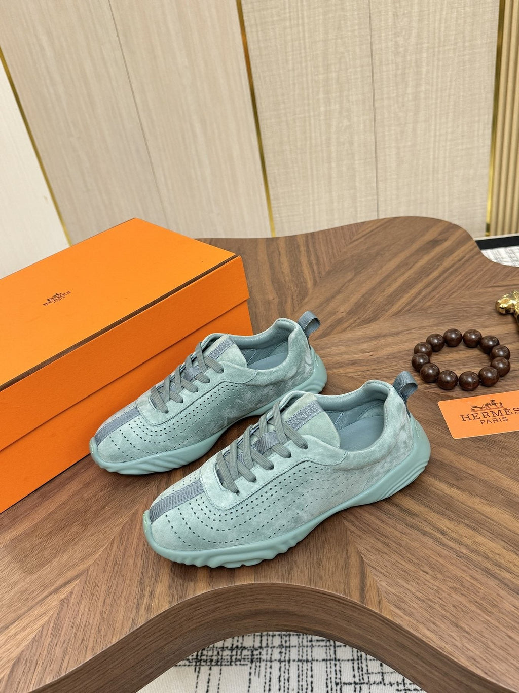 Hermès Perforated Low-Top Sneakers — front