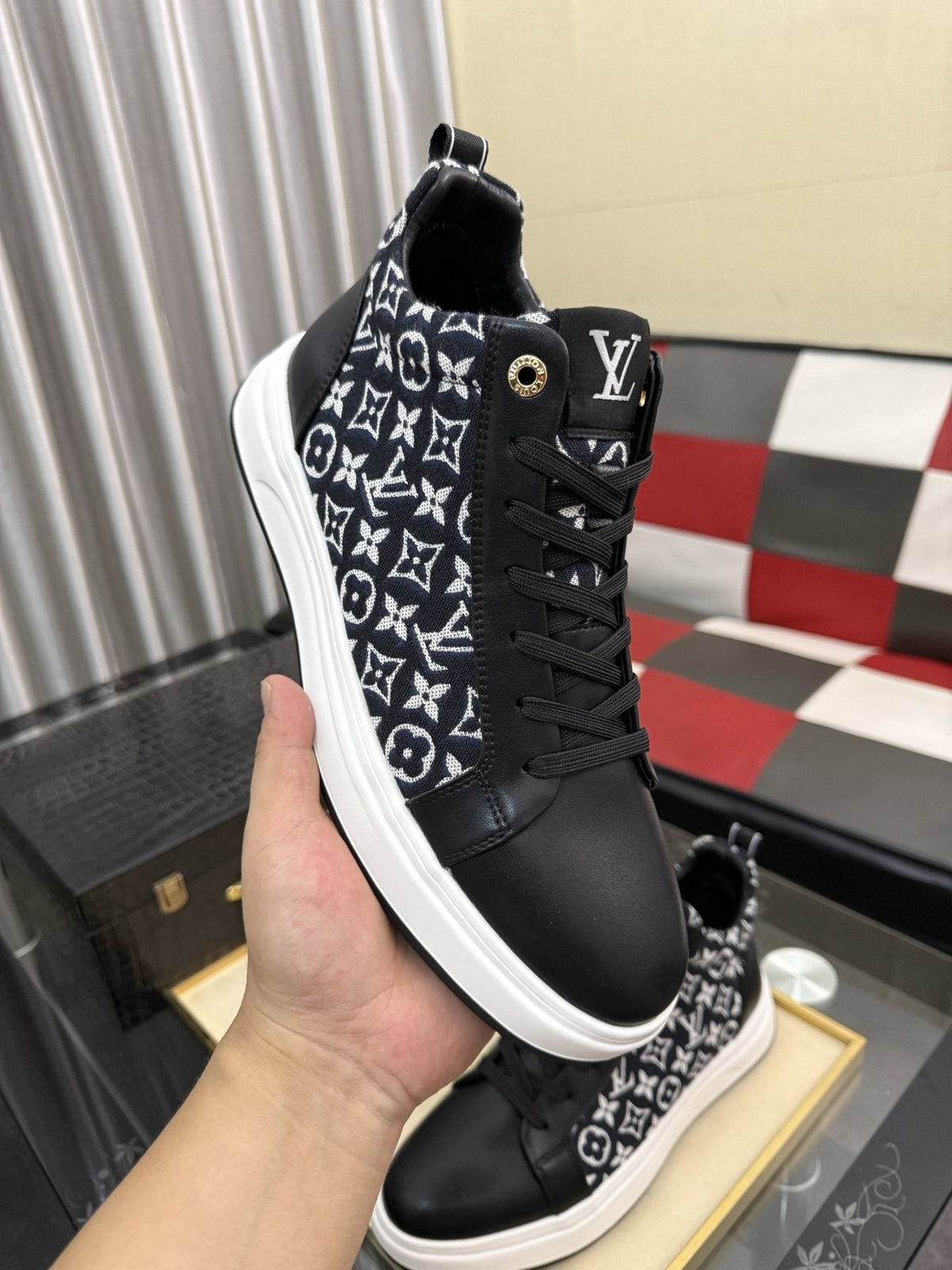 Louis Vuitton Patterned Panel High-Top Sneakers — model