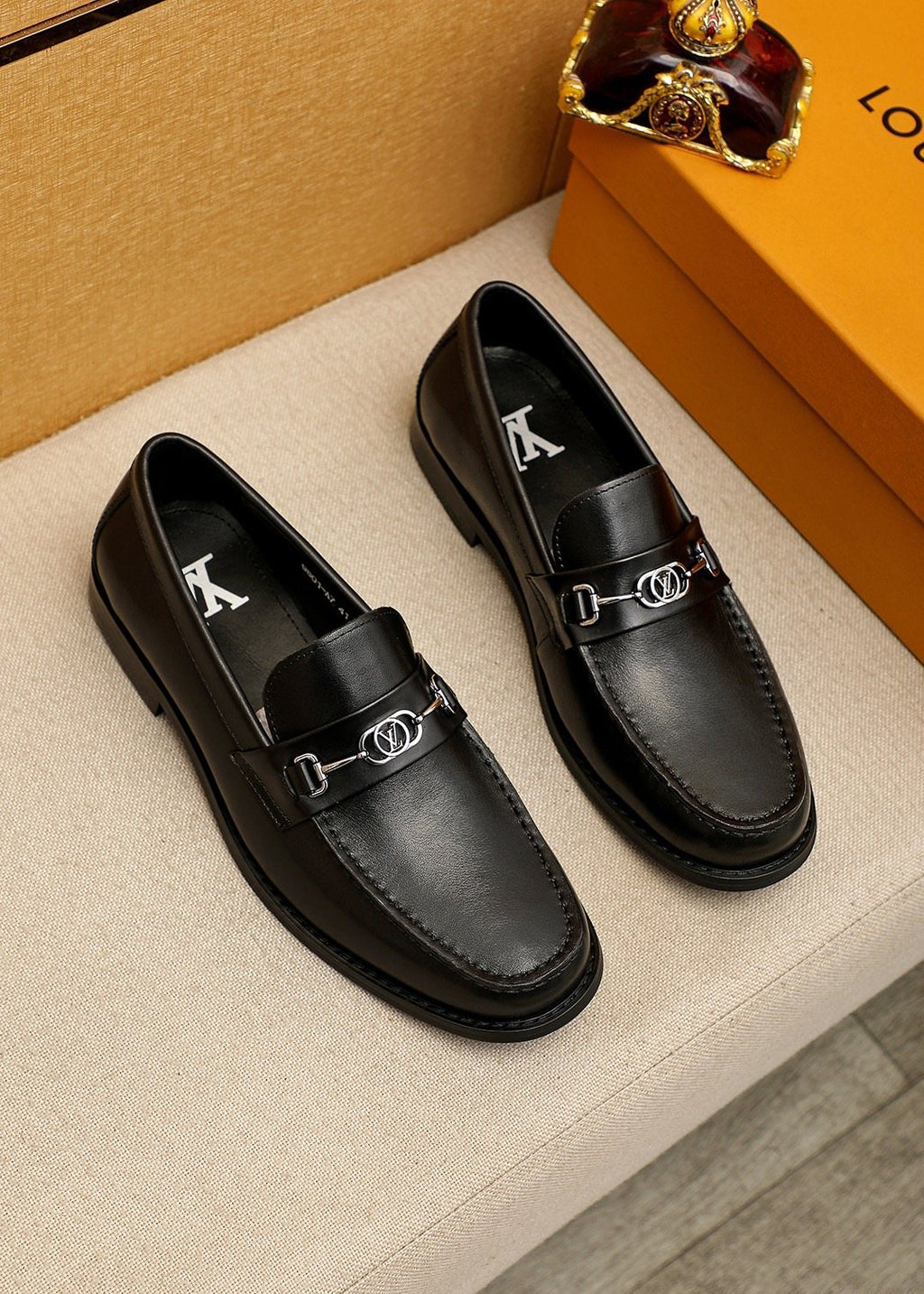 Louis Vuitton Black Leather Buckle Loafers — front