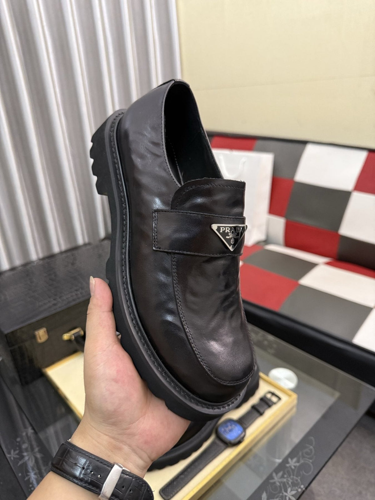 Prada Black Plaque Strap Loafers — model