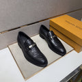 Louis Vuitton Embossed Metal-Bar Loafers — hero