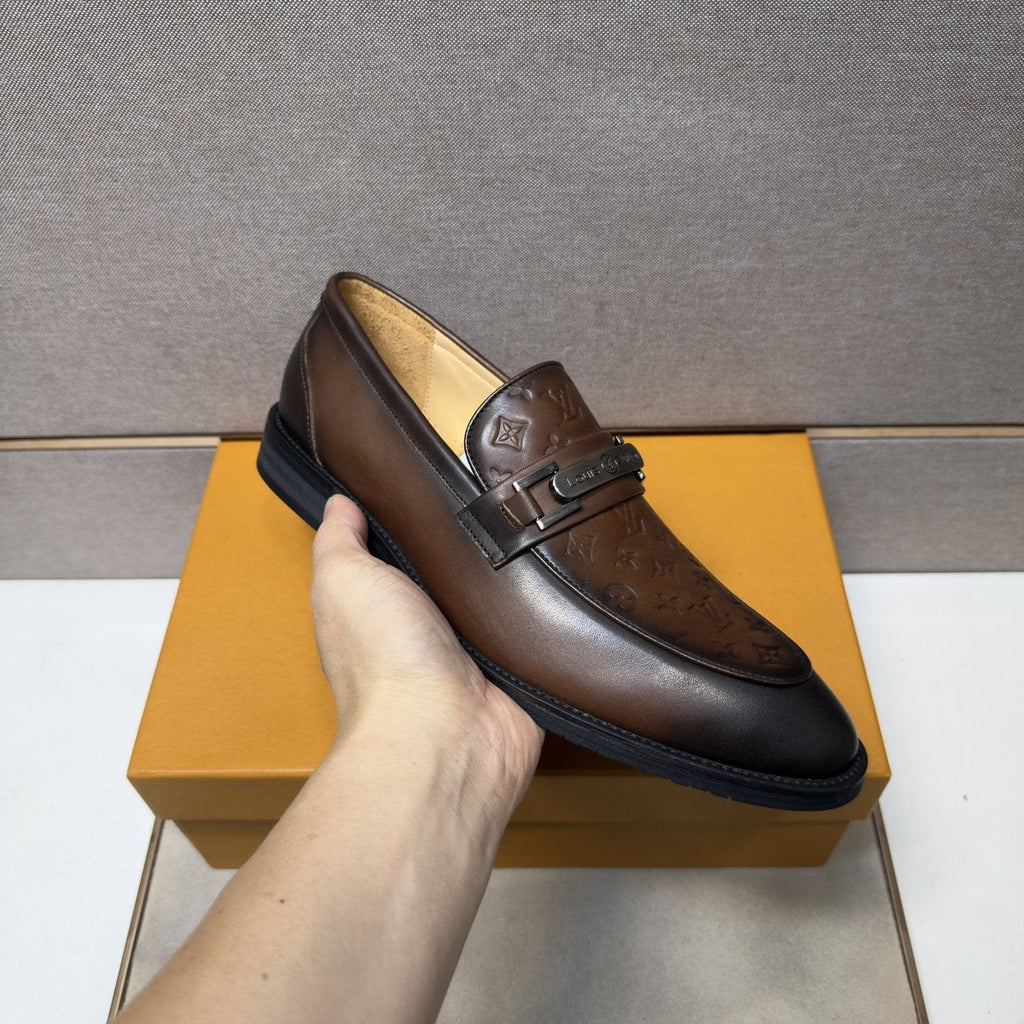 Louis Vuitton Embossed Metal-Bar Loafers — model