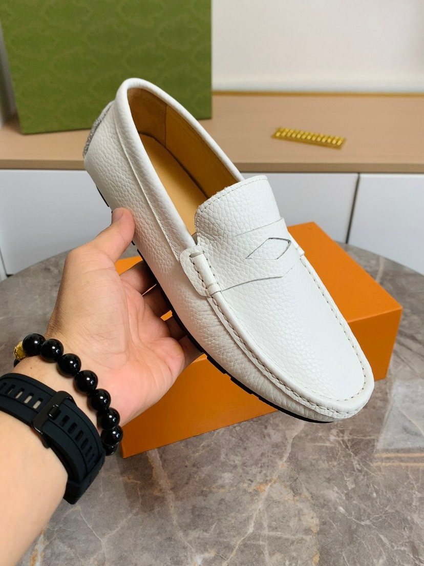 Louis Vuitton Textured Moc-Toe Loafers — model