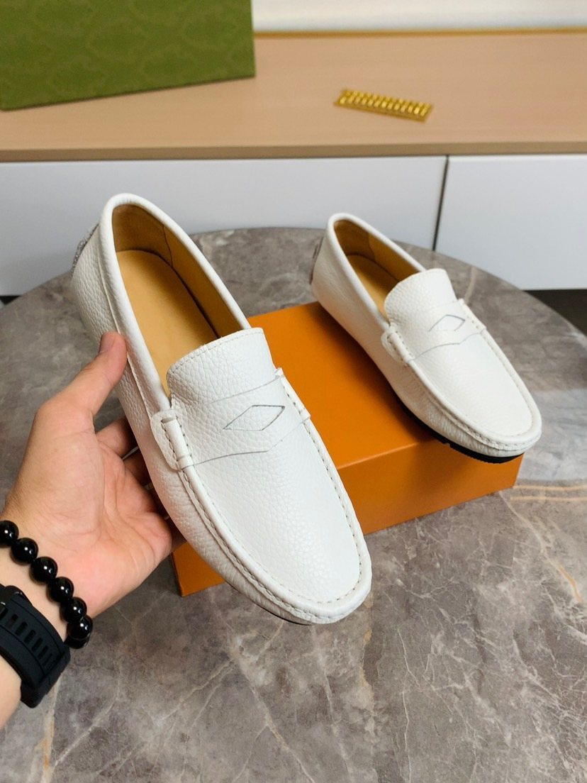 Louis Vuitton Textured Moc-Toe Loafers — model
