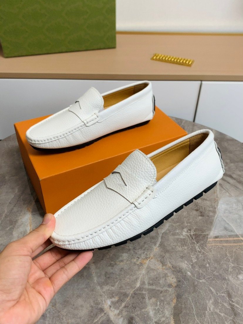 Louis Vuitton Textured Moc-Toe Loafers — model
