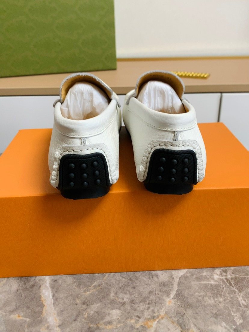 Louis Vuitton Textured Moc-Toe Loafers — back