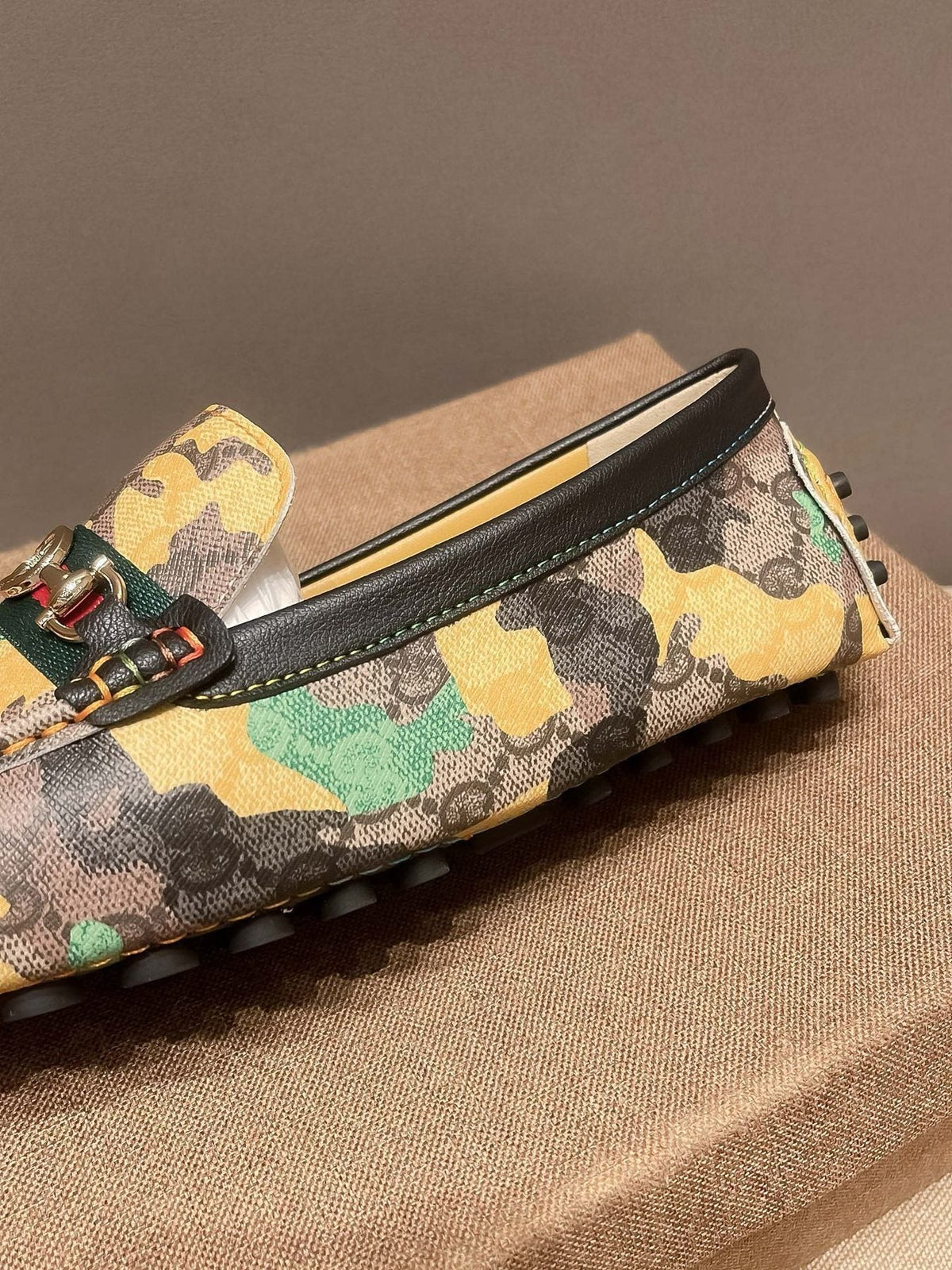 Gucci Patterned Metal-Accent Loafers — detail