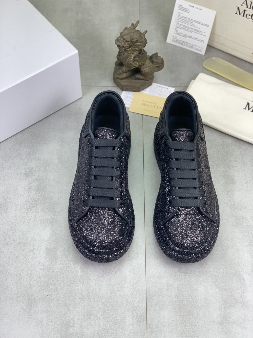 Alexander McQueen Black Glitter Low-Top Sneakers — hero