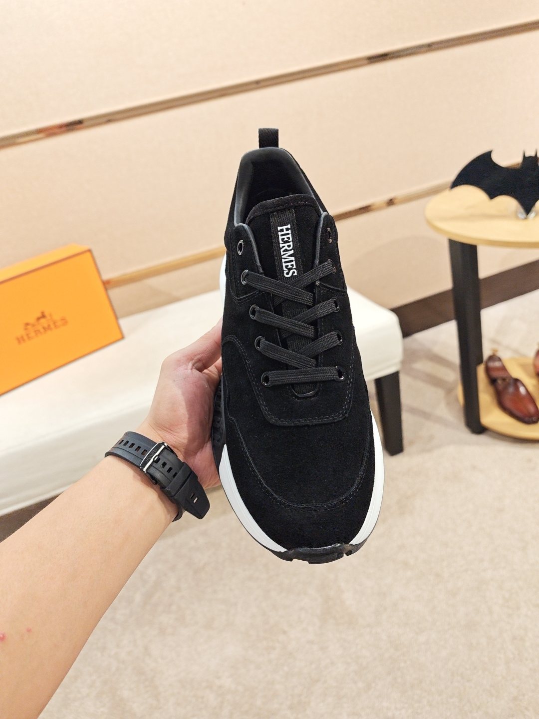 Hermès Lace-Up Sculpted-Sole Sneakers — model