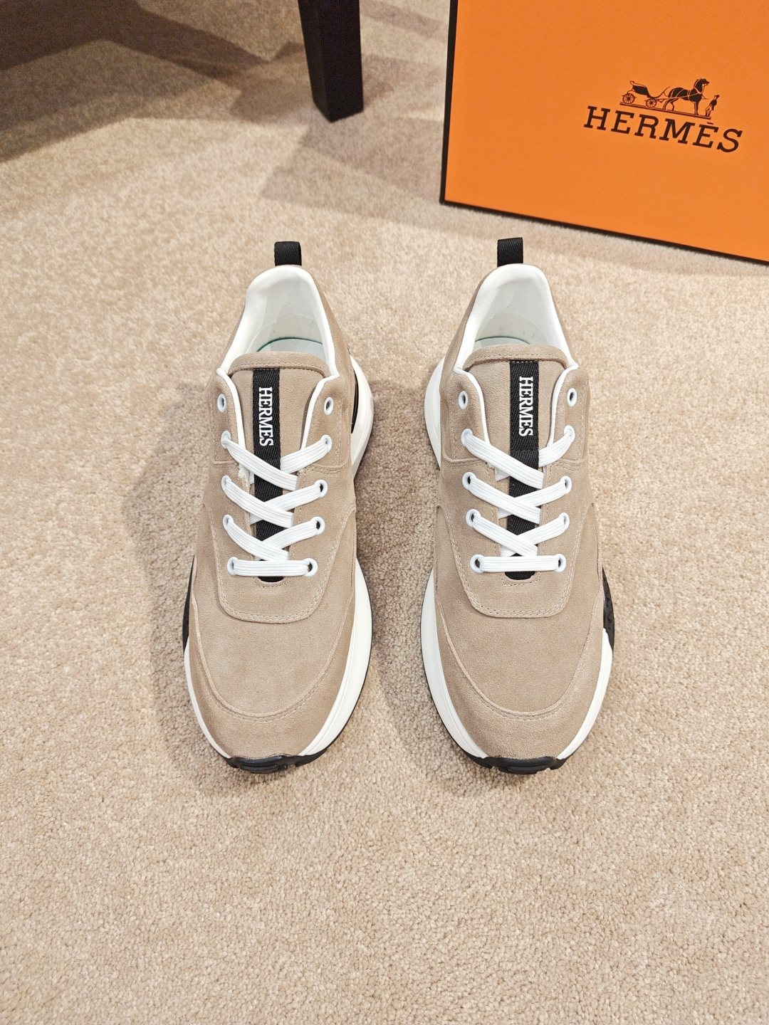 Hermès Lace-Up Sculpted-Sole Sneakers — front