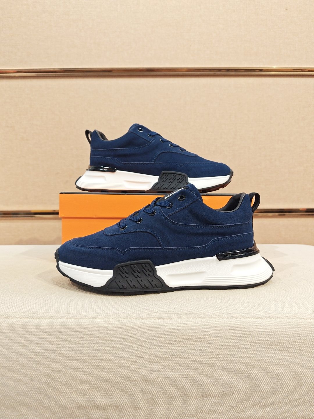 Hermès Lace-Up Sculpted-Sole Sneakers — side