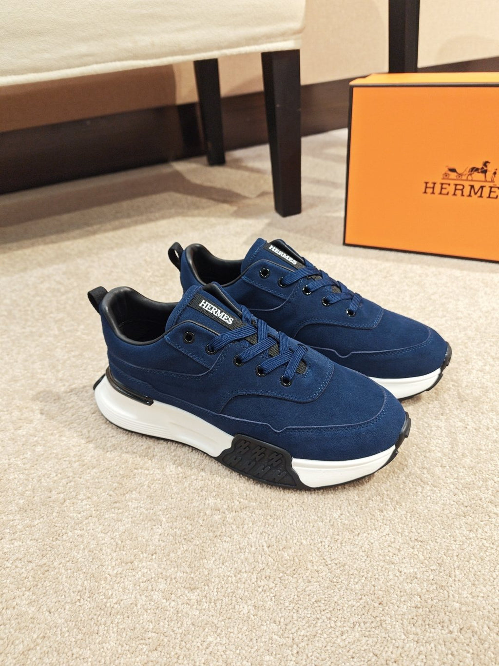 Hermès Lace-Up Sculpted-Sole Sneakers — front