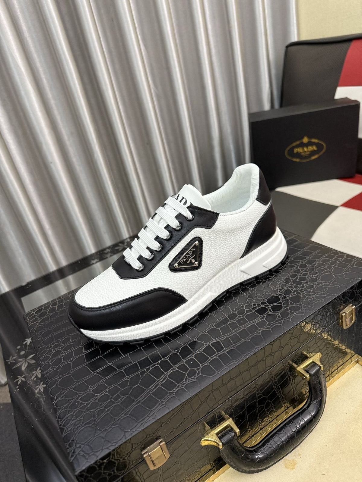 Prada Triangle Badge Low-Top Sneakers — front