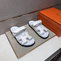 Hermès Cutout Slide Sandals — hero