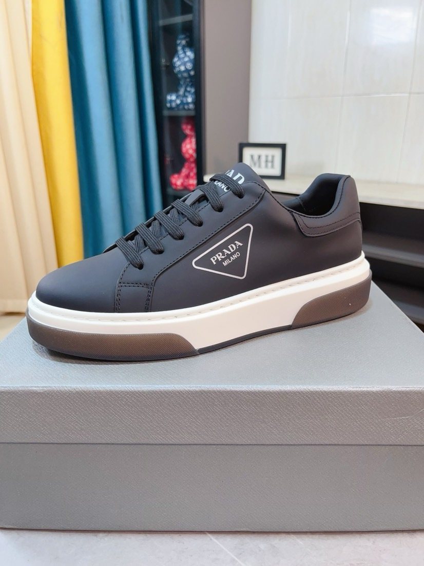 Prada Triangle Patch Low-Top Sneakers — hero