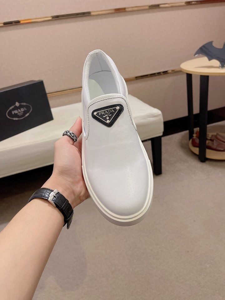 Prada Triangle-Patch Slip-On Shoes — front