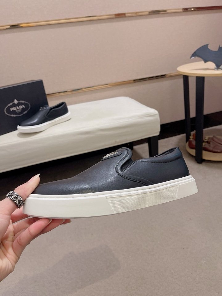 Prada Triangle-Patch Slip-On Shoes — side