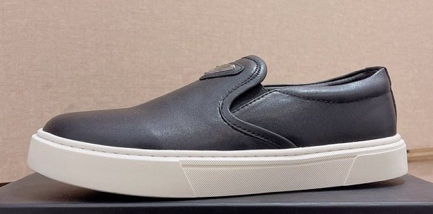 Prada Triangle-Patch Slip-On Shoes — hero
