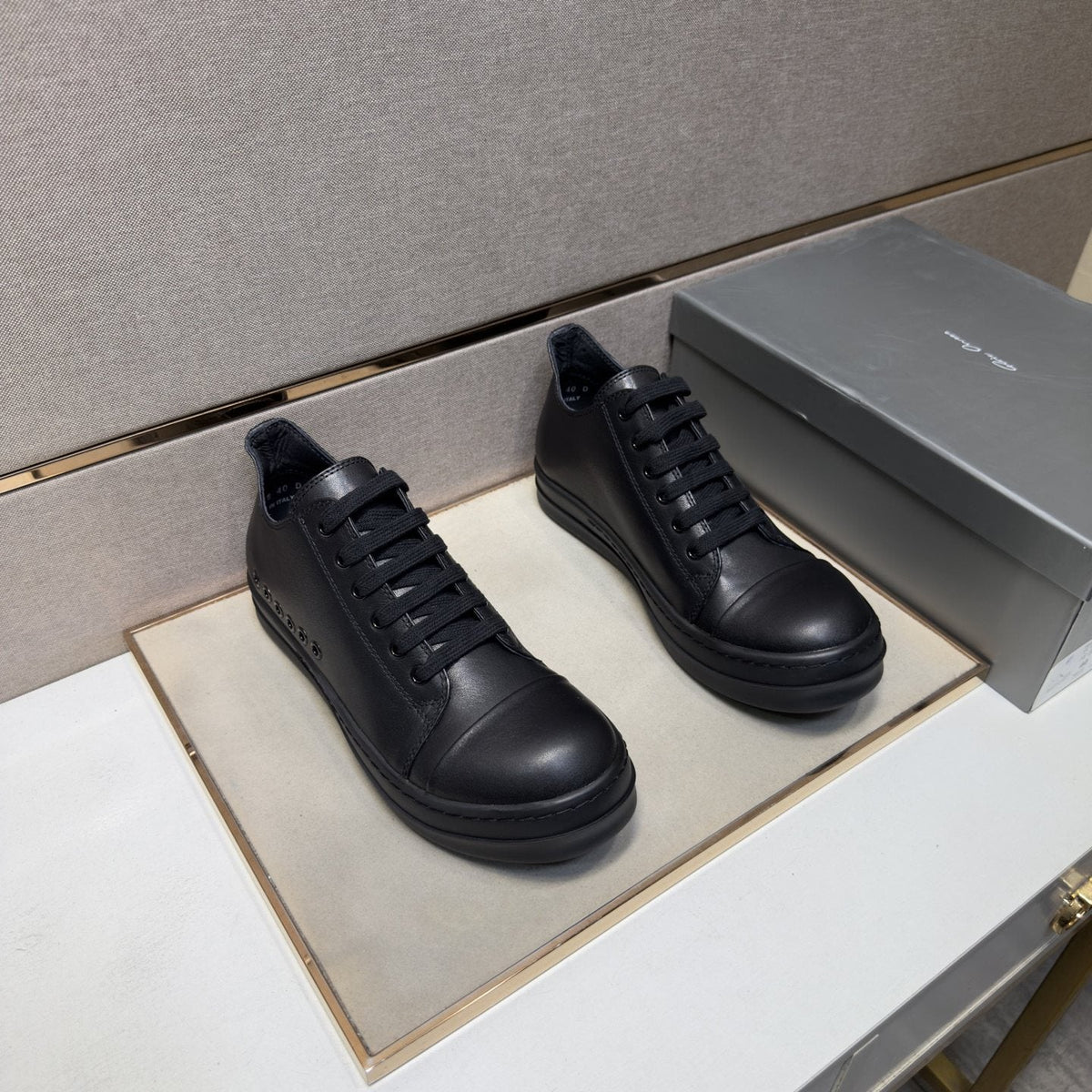 Black and Off-White Low-Top Sneakers — front