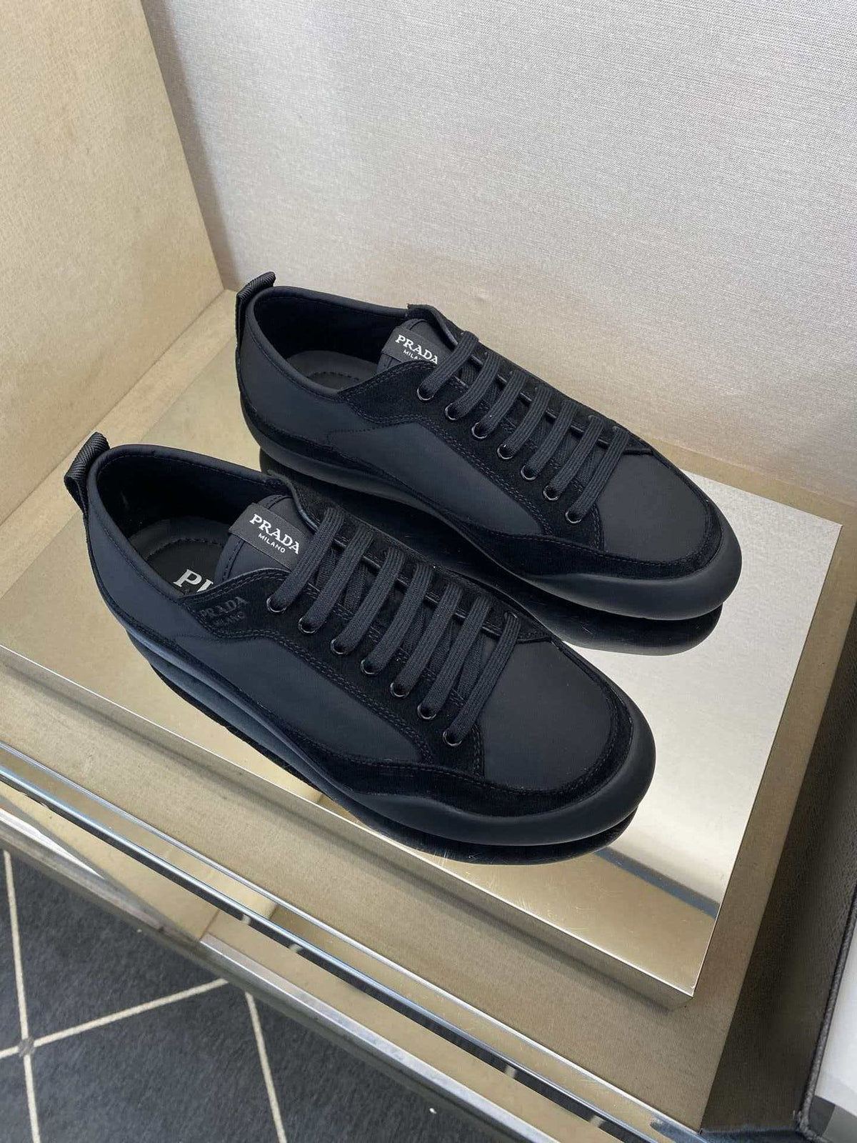 Prada Low-Top Leather Sneakers — model