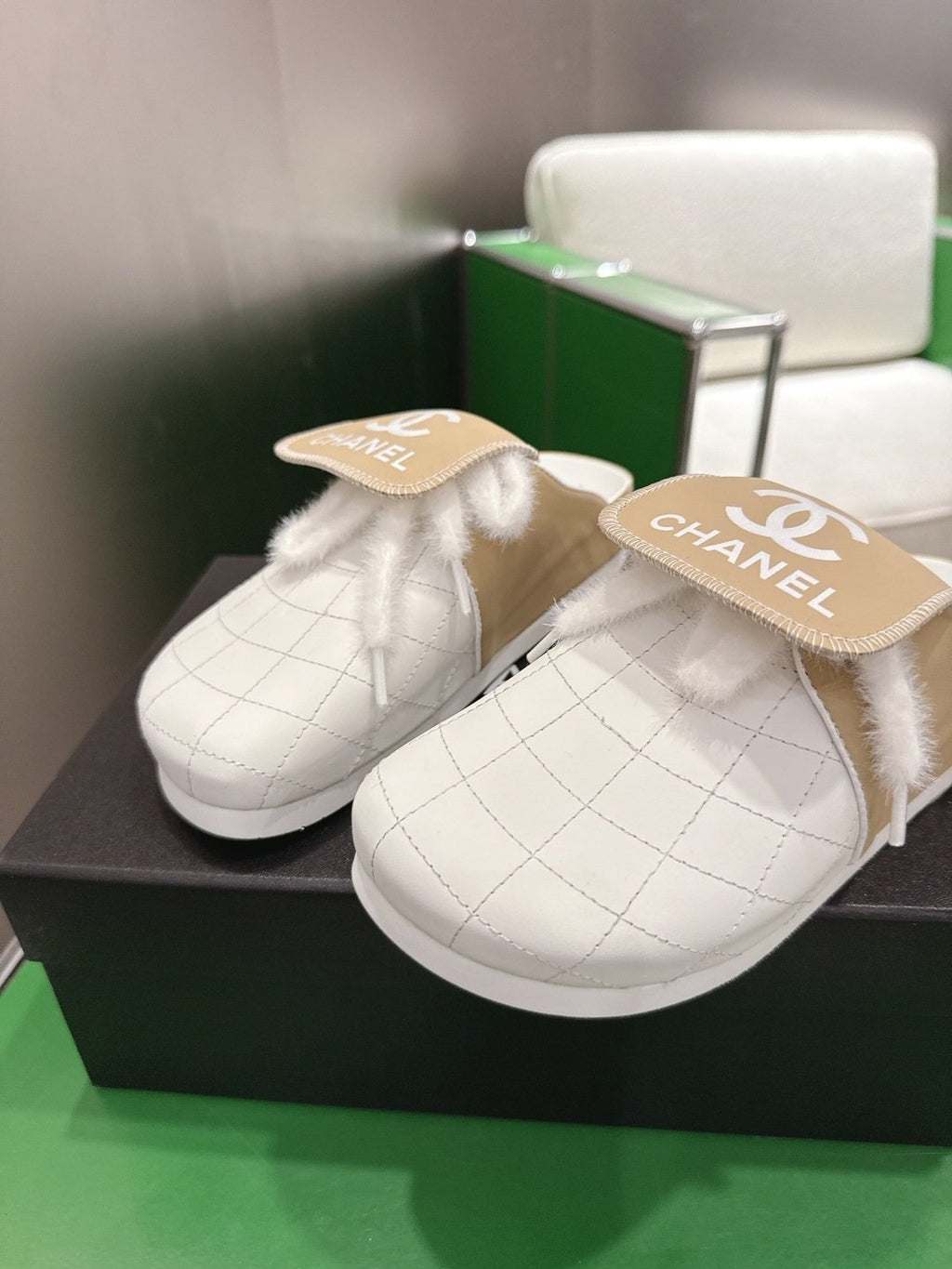 Chanel Quilted Closed-Toe Slip-On Shoes — front