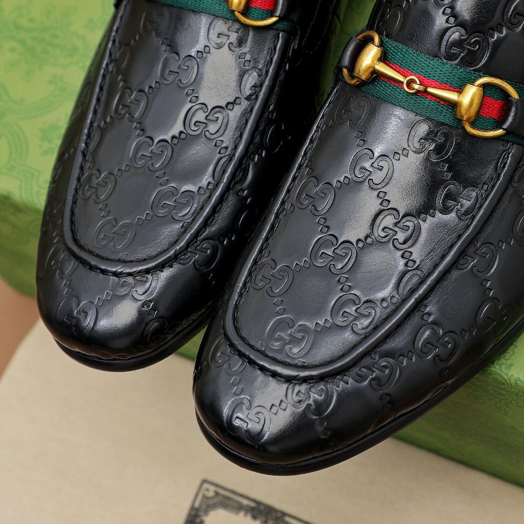 Gucci Patterned Metal-Bit Loafers — detail