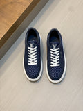 Louis Vuitton Textured Low-Top Sneakers — front
