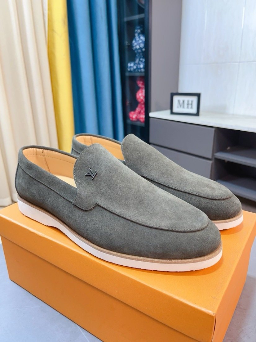 Louis Vuitton Textured Slip-On Loafers — front