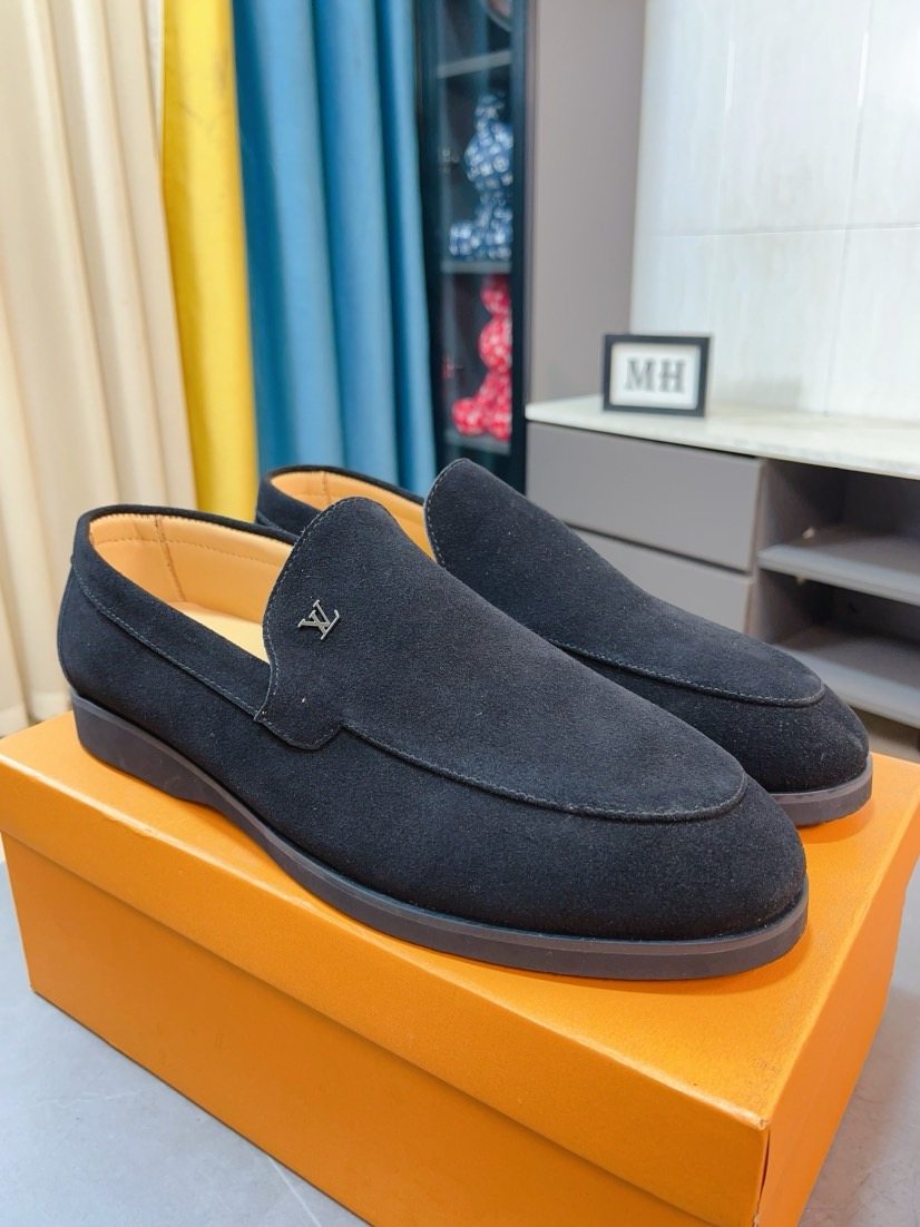 Louis Vuitton Textured Slip-On Loafers — front