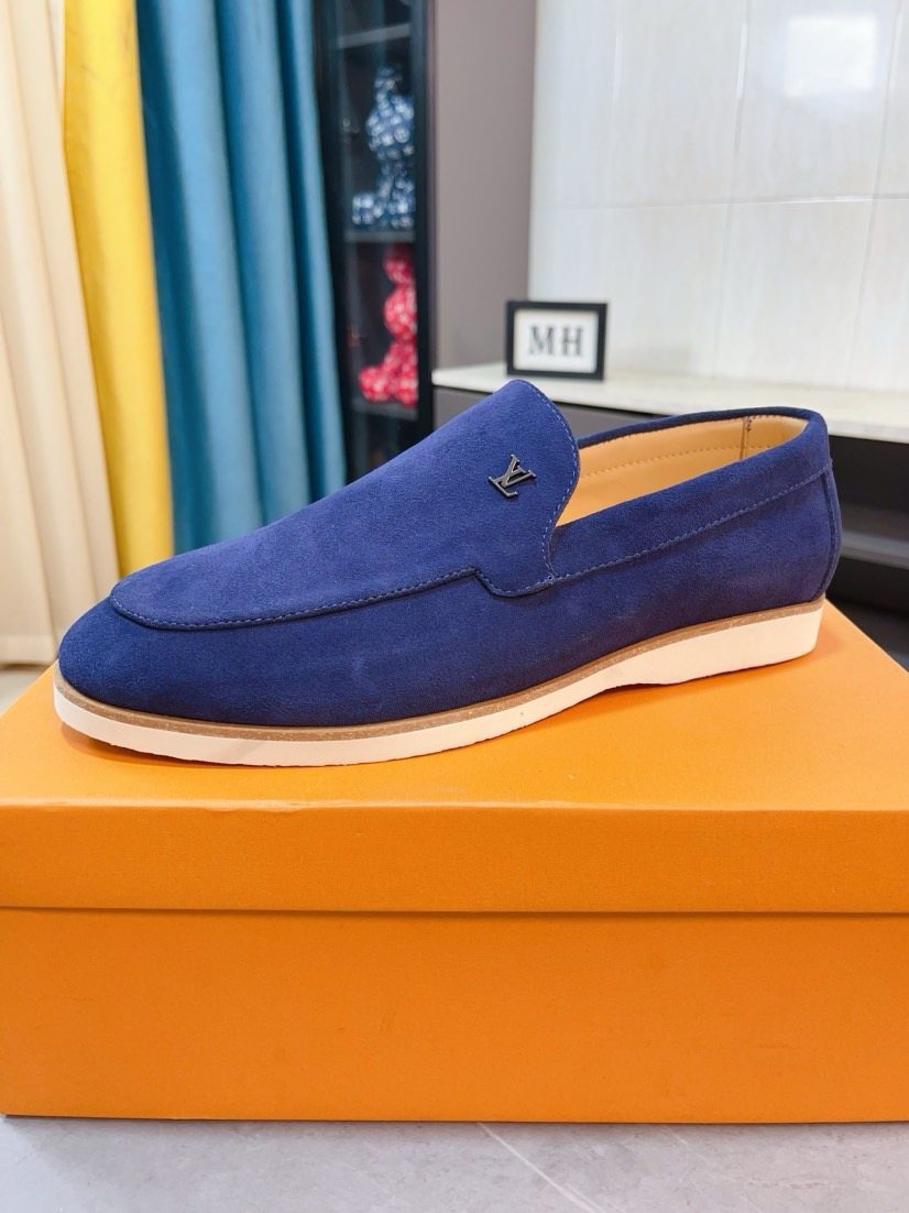 Louis Vuitton Textured Slip-On Loafers — front