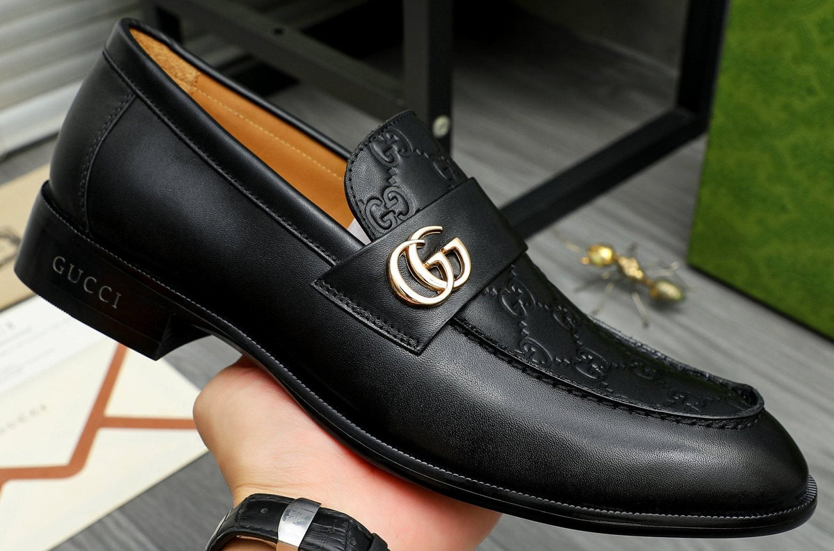 Gucci Black Embossed Loafers with Gold-Tone Detail — front