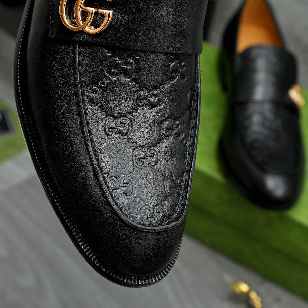 Gucci Black Embossed Loafers with Gold-Tone Detail — detail