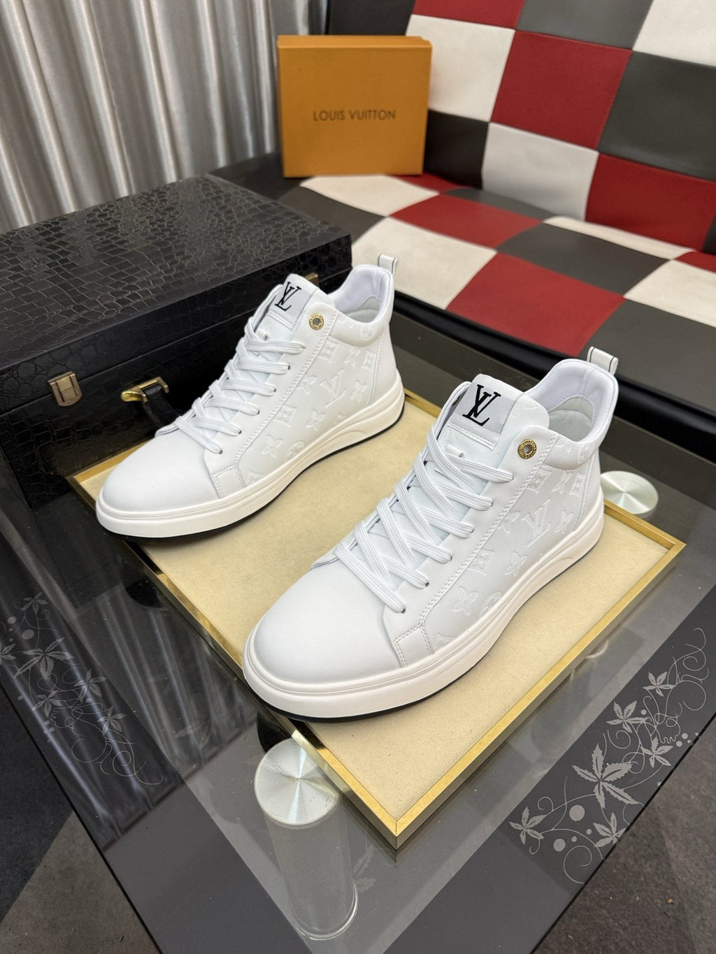 Louis Vuitton Embossed High-Top Sneakers — front