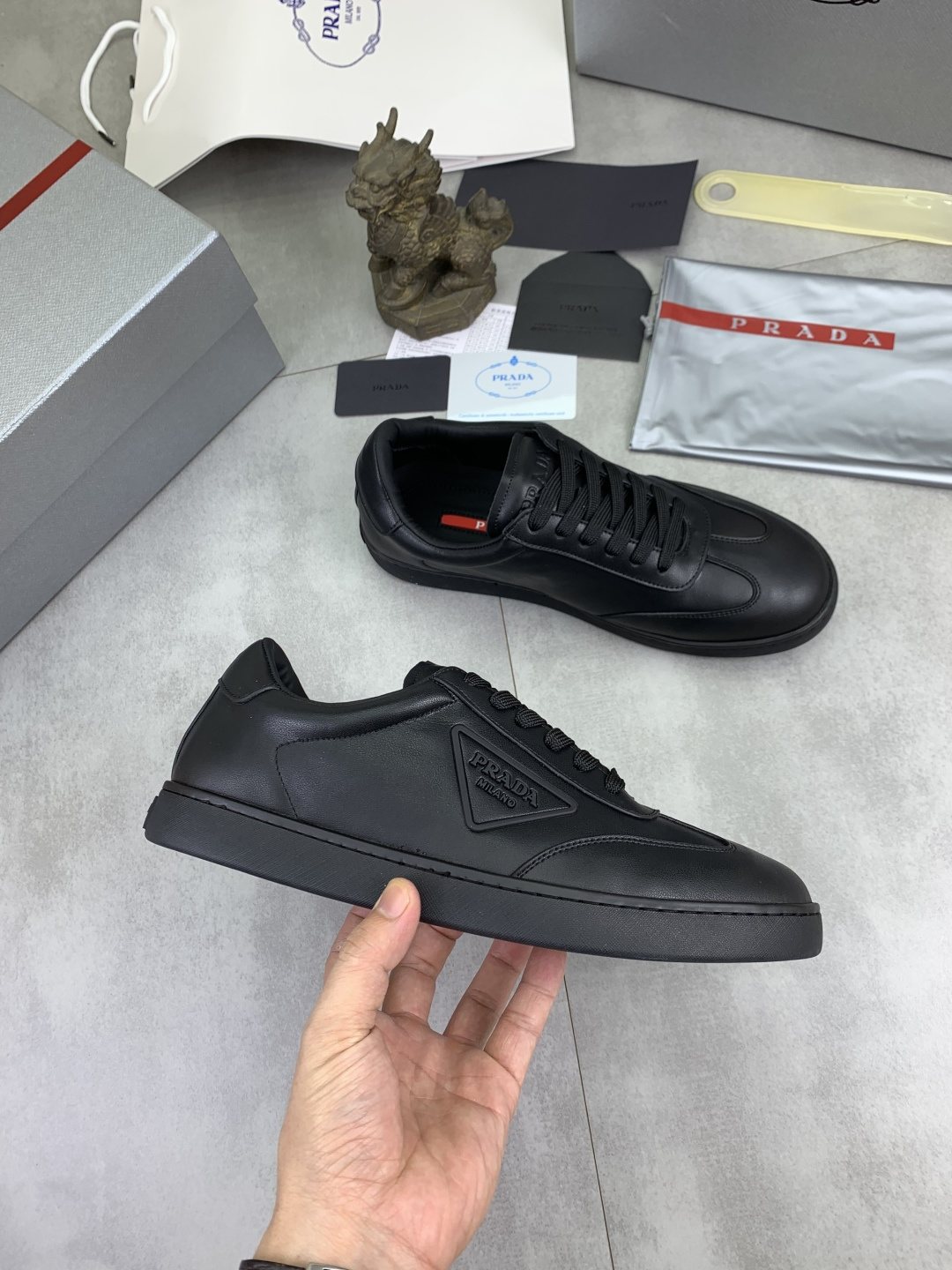 Prada Paneled Low-Top Sneakers — model