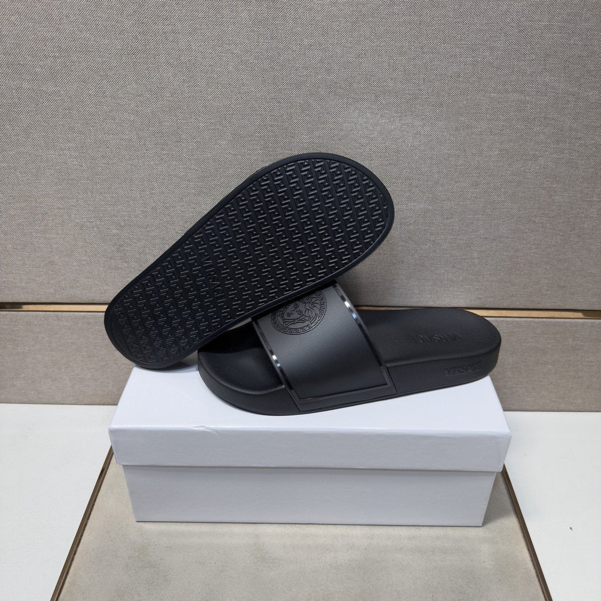 Versace Embossed Strap Slide Sandals — detail